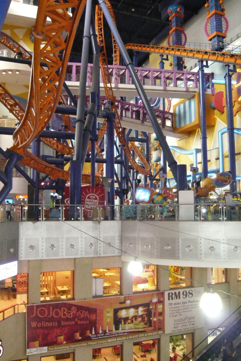 Theme park with rollercoaster on the top of Berjaya Times Square shopping mall