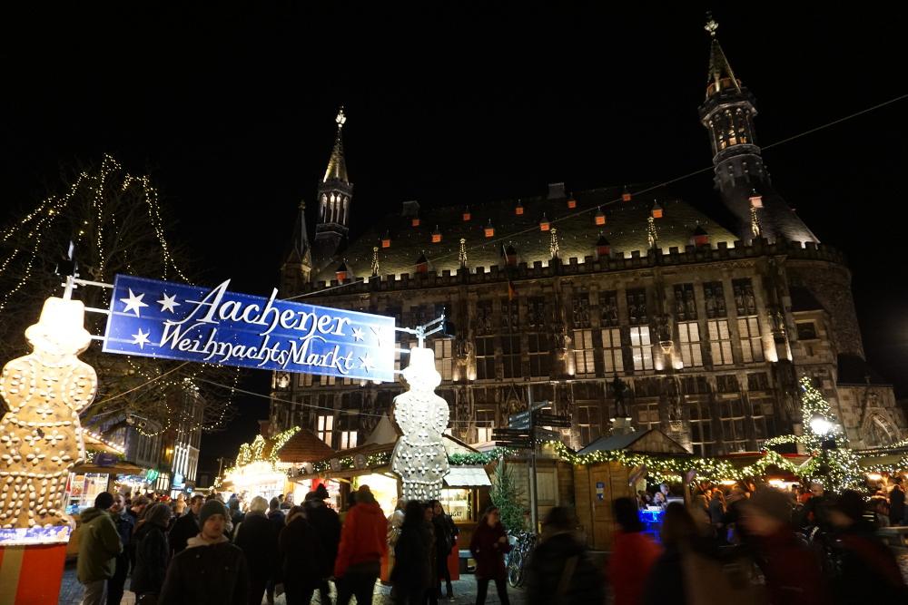 Aachen Christmas market stalls on the market square, in front the of the city hall