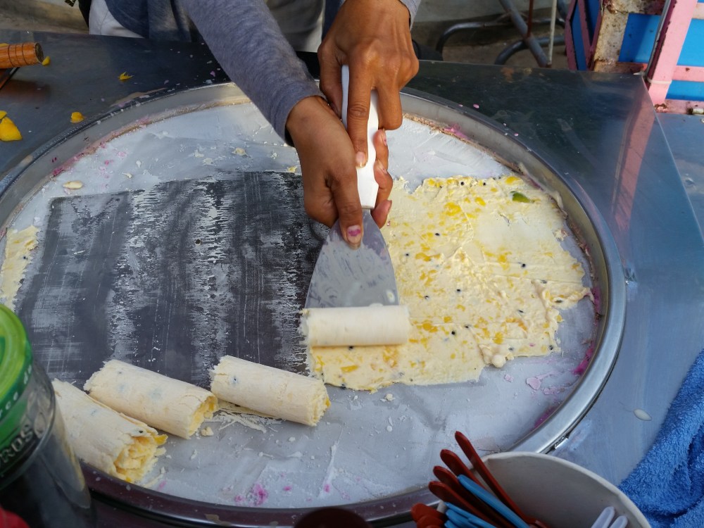 The making of my mango and passion fruit ice rolls, on the Night Market in Siem Reap